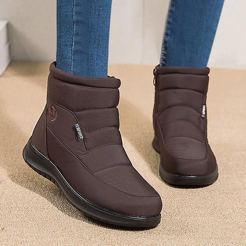 2022 Nuevas botas de invierno de felpa gruesa para mujeres Botas de nieve impermeables antideslizantes Zapatos acolchados de alg