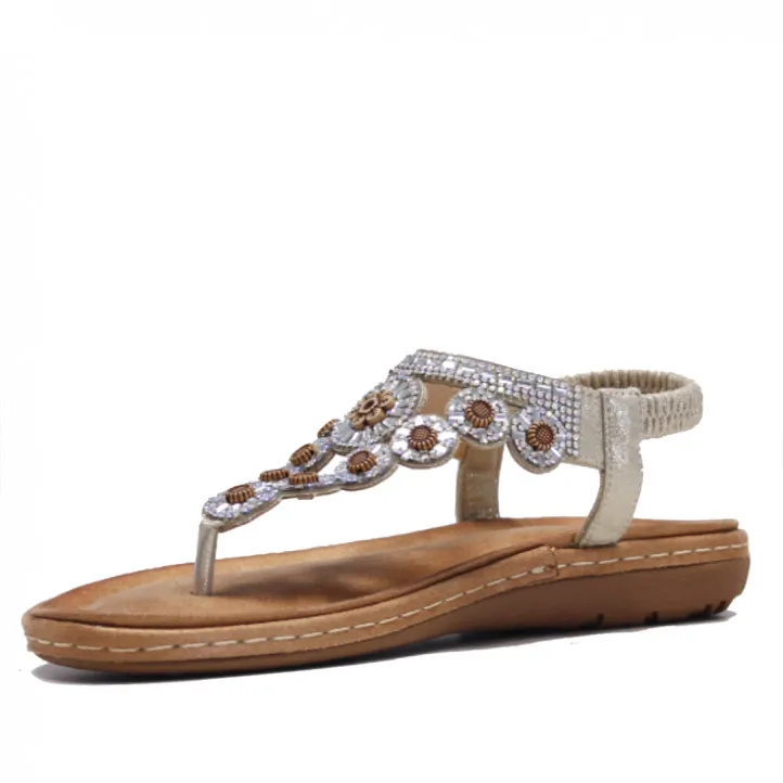 Sandalias planas Stay color crema con brillantes cogidas al tobillo